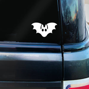 White vinyl bat decal on car glass
