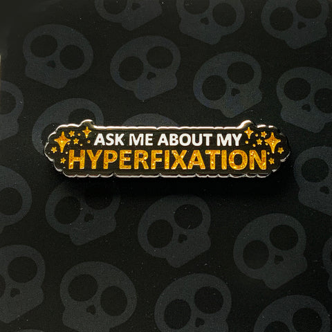 Ask Me About My Hyperfixation - 2" Hard Glitter Enamel Pin